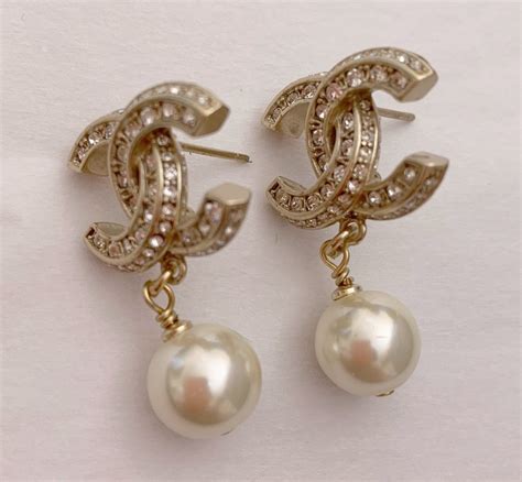 chanel dangling pearl earrings|chanel earrings cc real.